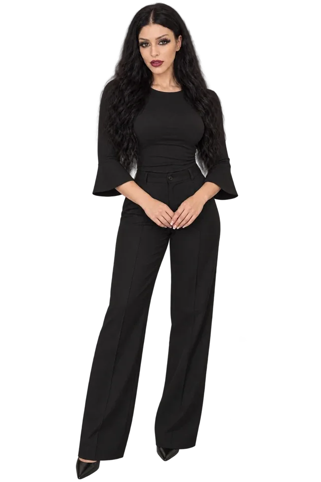 Full-length author portrait of Nia standing beside the book preview